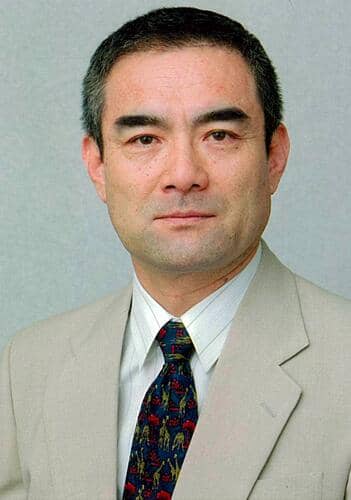 辻万长